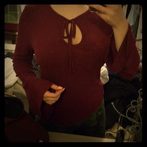 Belle-sleeved maroon blouse